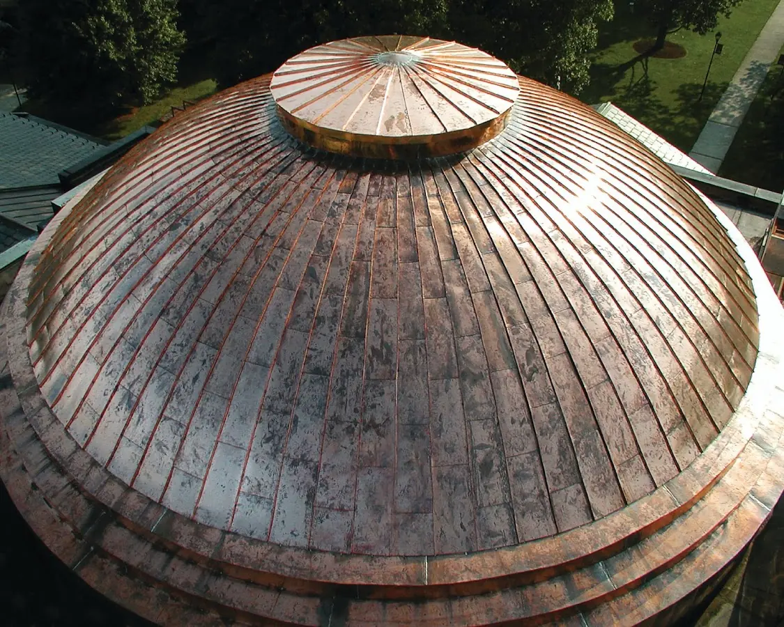 Craftsman Roofing crew installing a new roof in La Junta